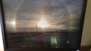 On December 21, 2012, I witnessed magic in the sky - a rainbow around the sun - something I had never seen before. It was amazing, and I couldn't understand why no one else driving along seemed to see it. I stopped on Old School Road near Creditview Road and captured this amazing phenomenon.